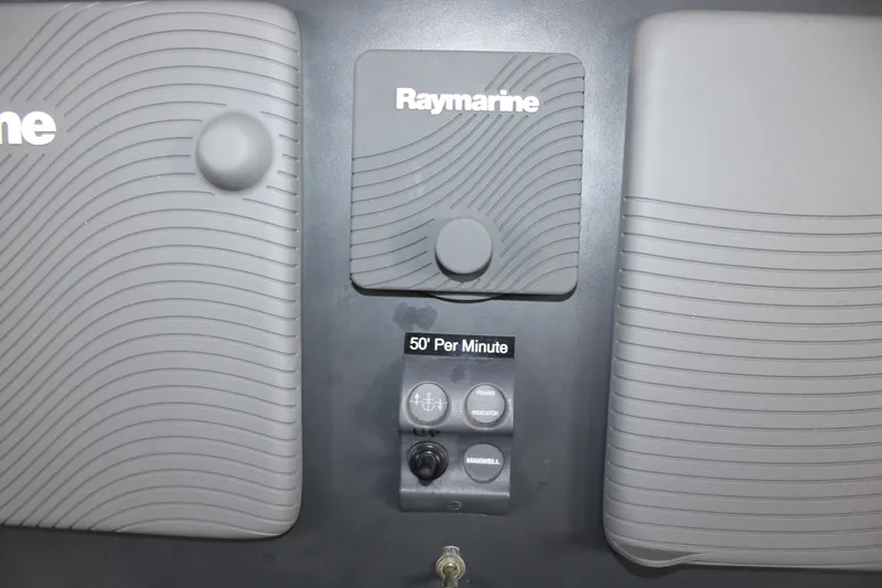 Slide: The Image of Raymarine control panel on 2001 Nordhavn 40 yacht dashboard. - 12