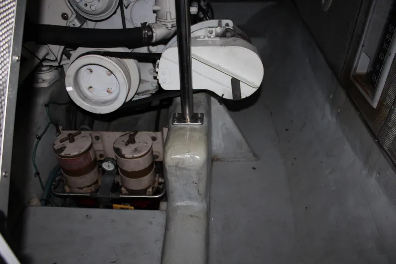 Slide: The Image of Engine room of 2001 Nordhavn 40 yacht, showcasing mechanical components and equipment. - 21