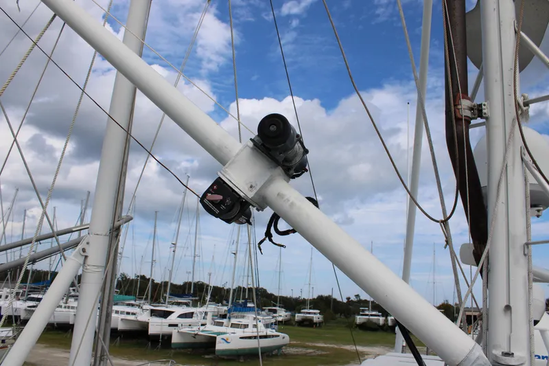 Slide: The Image of Nordhavn 40 sailboat mast with radar equipment, 2001 model, docked in a marina. - 29