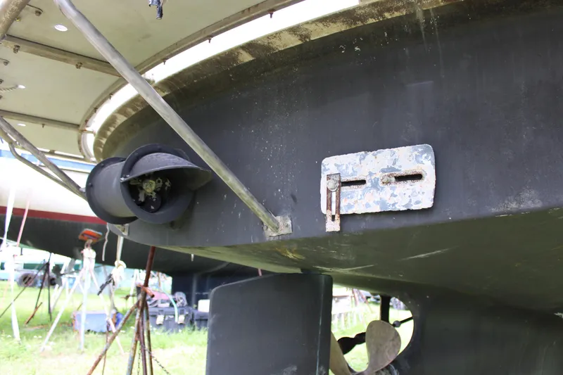 Slide: The Image of Nordhavn 40 (2001) boat hull and propeller detail in a shipyard. - 5
