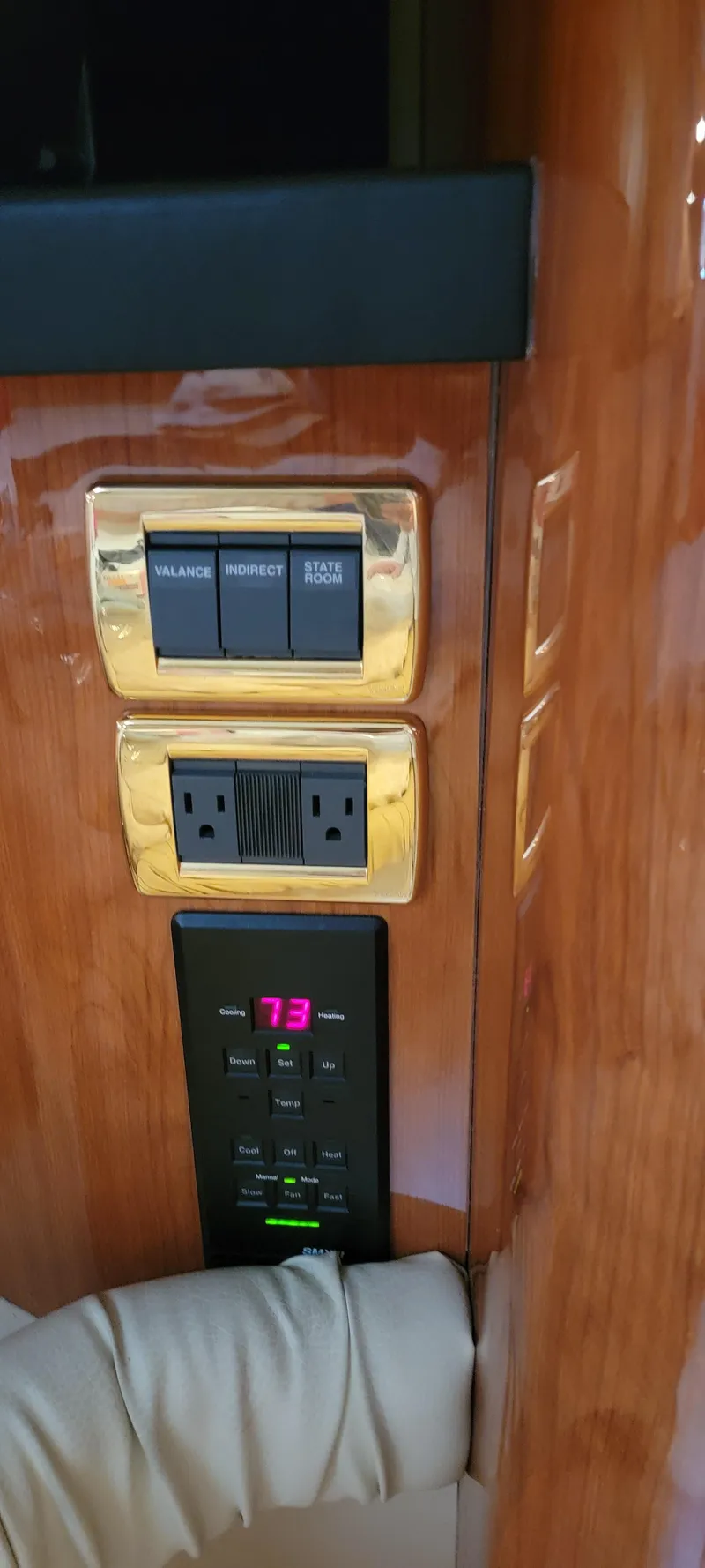 Slide: The Image of Control panel and outlets on 2000 Sea Ray 380 Sundancer yacht interior. - 31