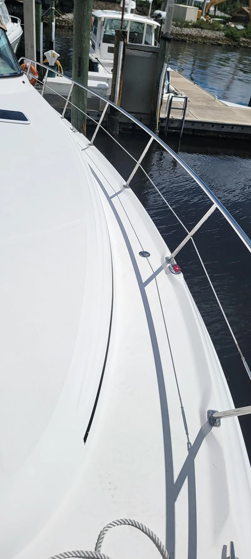 Slide: The Image of 2000 Sea Ray 380 Sundancer yacht docked at marina. - 44