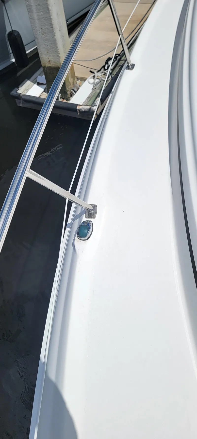 Slide: The Image of 2000 Sea Ray 380 Sundancer boat deck with railing, docked at marina. - 47