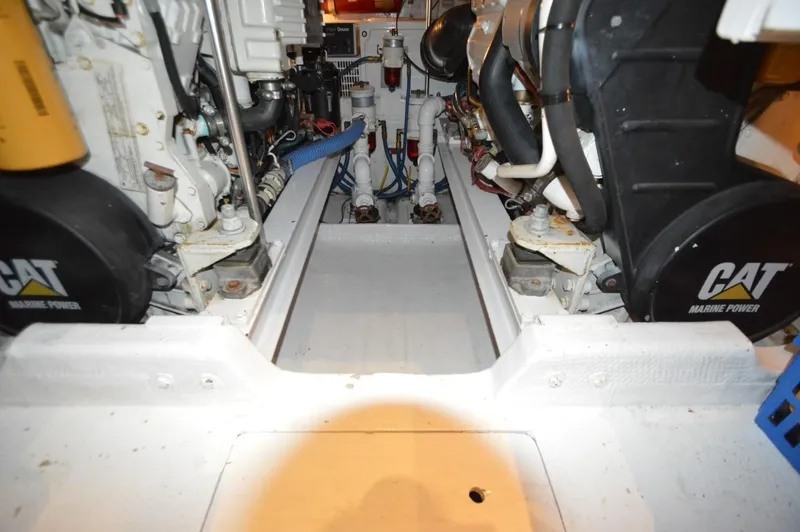 Slide: The Image of Engine room of 1990 Viking 38 Convertible with CAT marine engines. - 24