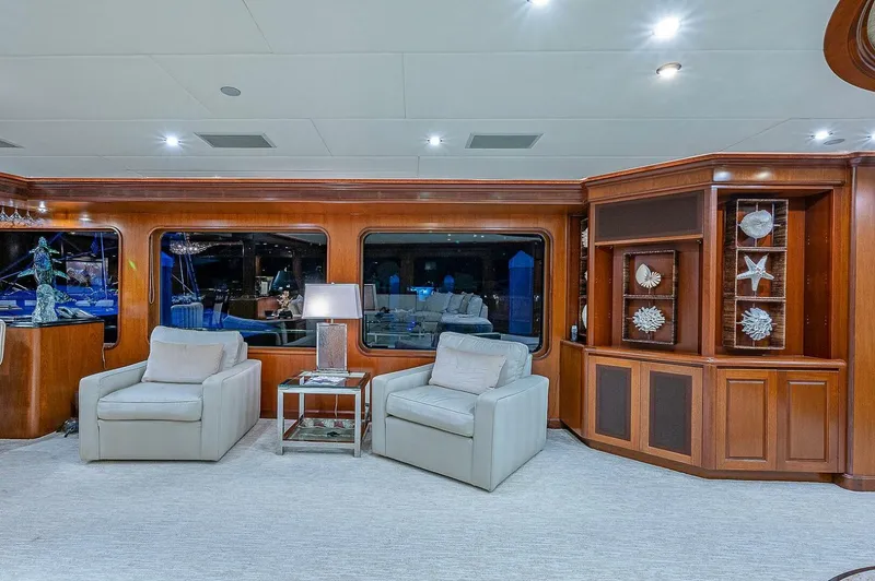Slide: The Image of Luxurious interior of 2000 Christensen 141 Raised Pilothouse yacht with elegant seating and decor. - 17