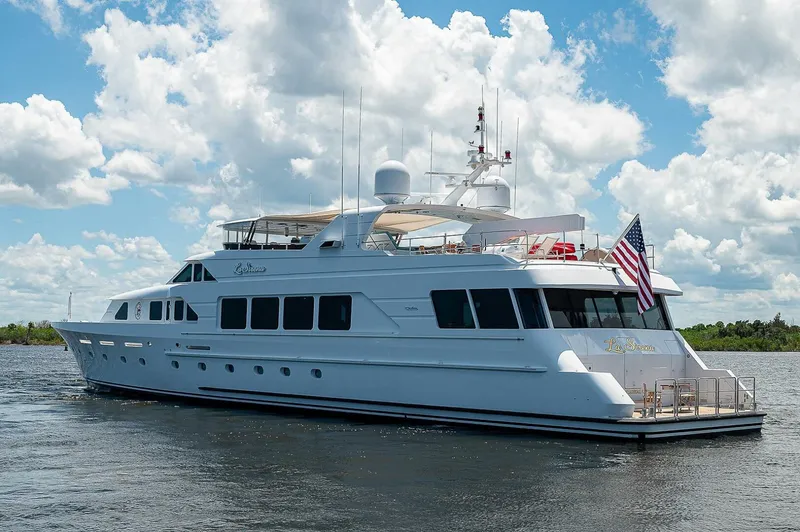 Slide: The Image of Luxury Christensen 141 Raised Pilothouse yacht, 2000 model, cruising on a sunny day. - 6