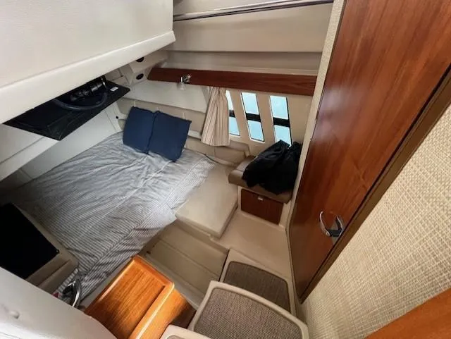 Slide: The Image of Interior cabin of 2019 Ranger Tugs R-41 CB with bed and wooden accents. - 37