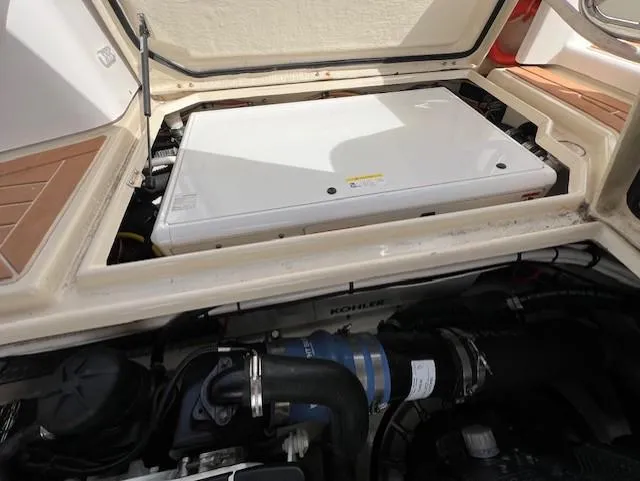 Slide: The Image of Engine compartment of 2019 Ranger Tugs R-41 CB with Kohler generator visible. - 41