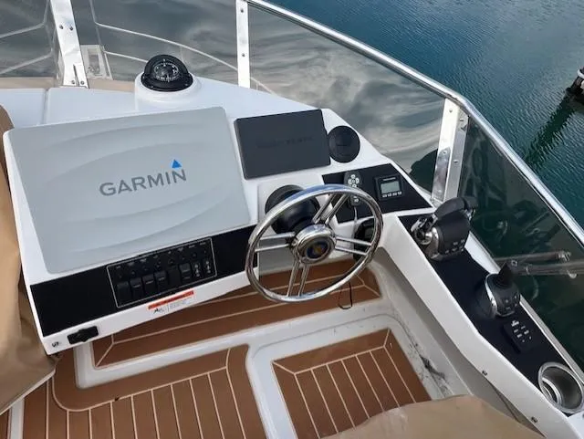 Slide: The Image of Cockpit of 2019 Ranger Tugs R-41 CB with Garmin navigation system. - 44