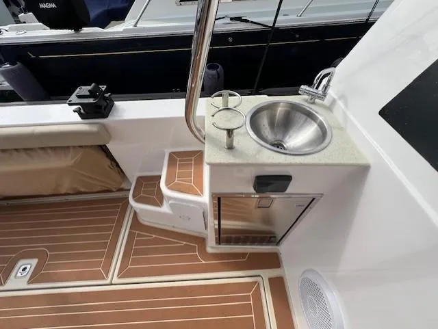Slide: The Image of 2019 Ranger Tugs R-41 CB boat deck with sink and storage. - 9