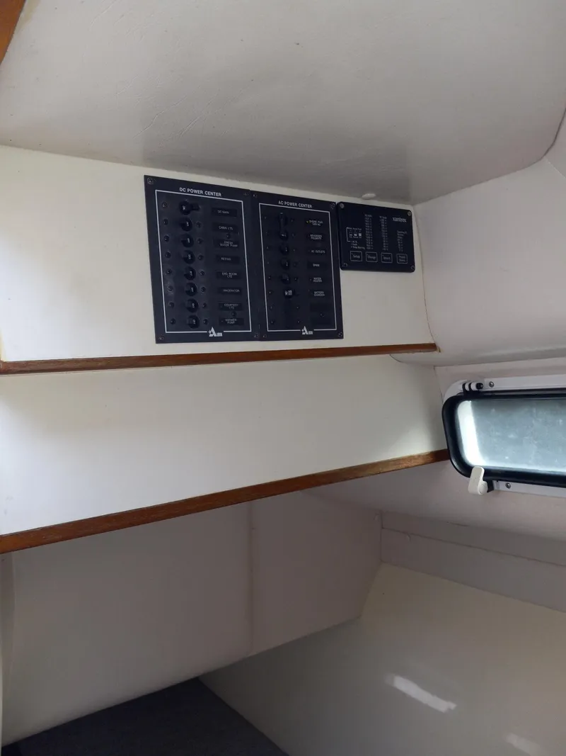 Slide: The Image of 1995 Albin 28 Tournament Express interior control panel. - 6