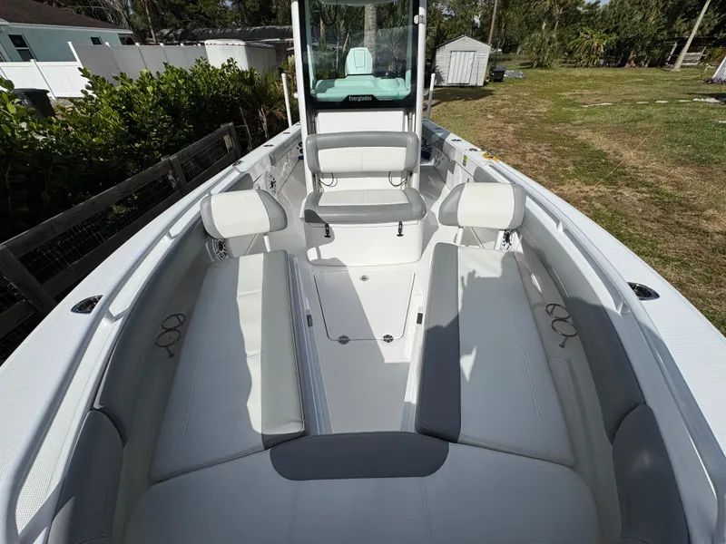 Slide: The Image of 2024 Everglades 253 Center Console boat with spacious seating and modern design. - 11