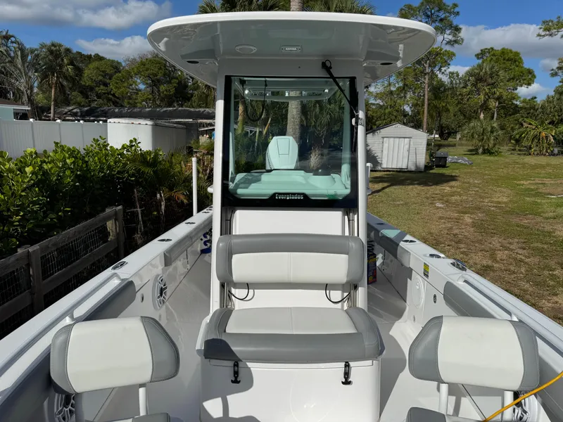 Slide: The Image of 2024 Everglades 253 Center Console boat with seating, outdoors. - 22