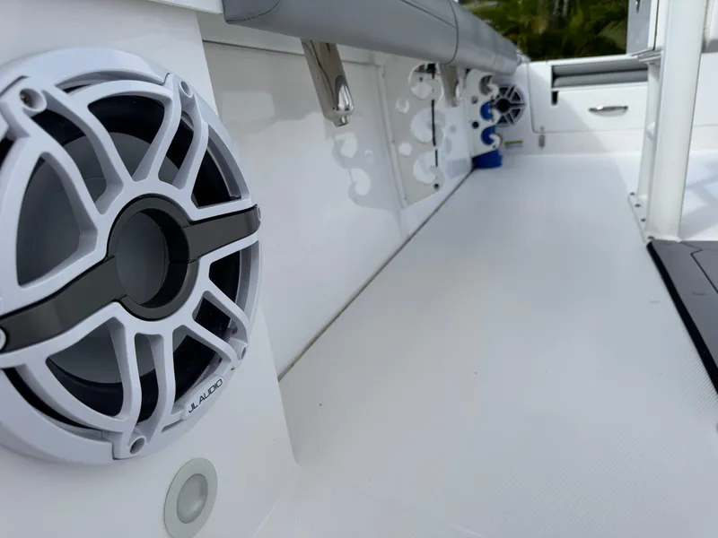 Slide: The Image of 2024 Everglades 253 Center Console boat interior with JL Audio speakers. - 33