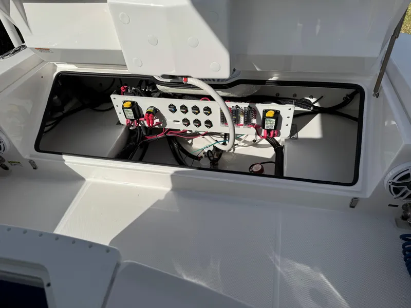 Slide: The Image of 2024 Everglades 253 Center Console electrical panel with wiring and components. - 38
