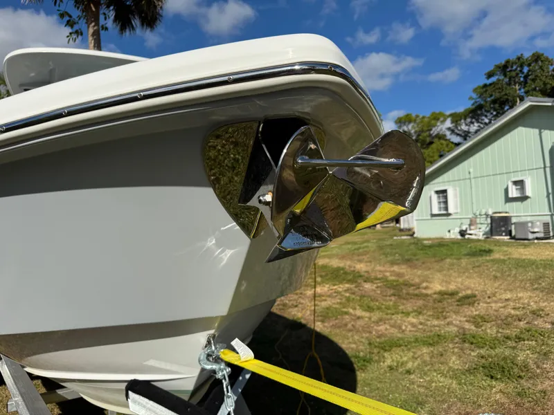 Slide: The Image of 2024 Everglades 253 Center Console boat on trailer, close-up of bow and anchor. - 9