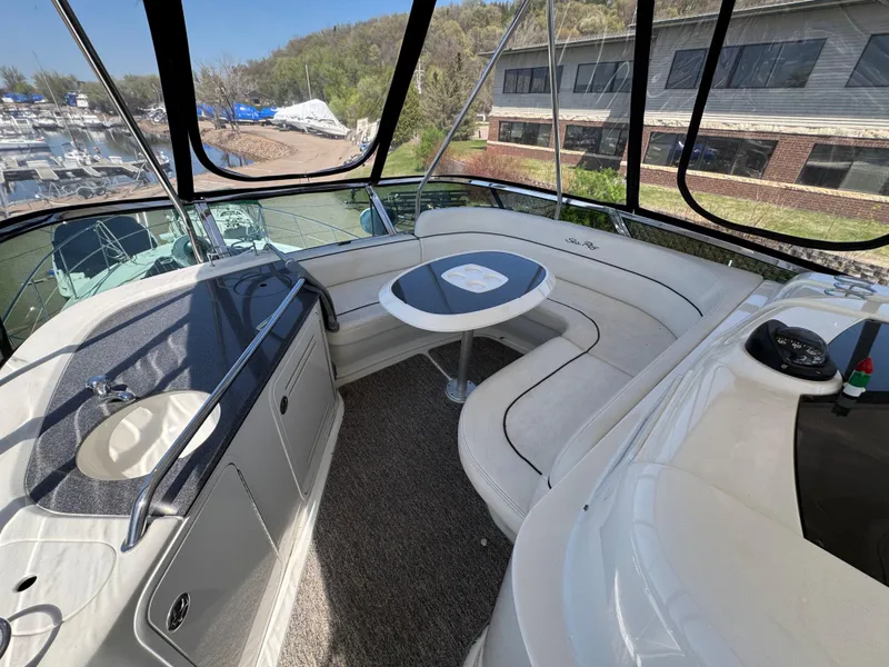 Slide: The Image of 2005 Sea Ray 500 Sedan Bridge Fresh Water yacht interior with seating and table. - 21