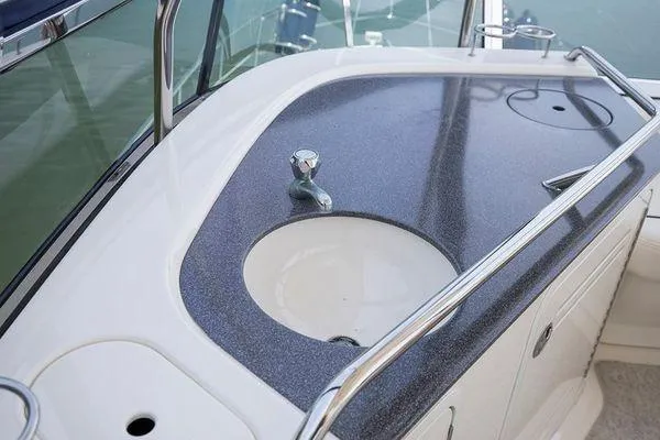 Slide: The Image of 2005 Sea Ray 500 Sedan Bridge yacht sink and countertop detail. - 23