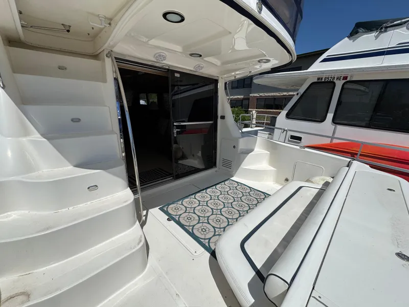 Slide: The Image of 2005 Sea Ray 500 Sedan Bridge Fresh Water yacht interior with stairs and seating area. - 31