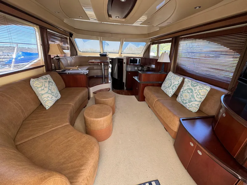 Slide: The Image of Luxurious interior of 2005 Sea Ray 500 Sedan Bridge yacht with plush seating and elegant decor. - 37