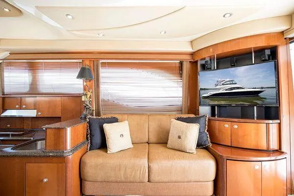 Slide: The Image of Luxurious interior of 2005 Sea Ray 500 Sedan Bridge yacht with plush seating and modern decor. - 38