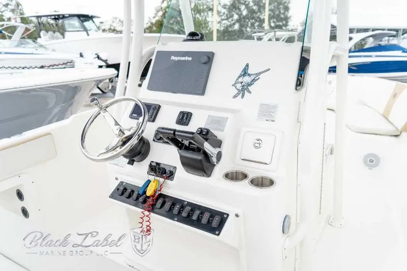 Slide: The Image of Steering console of a 2017 Century 2600 boat with Raymarine electronics. - 20