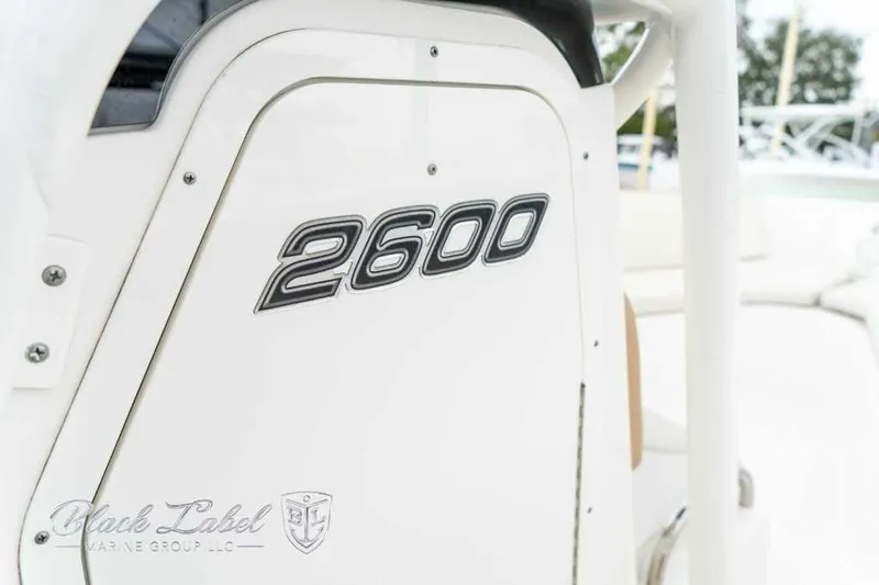 Slide: The Image of 2017 Century 2600 boat detail with logo, white exterior. - 21