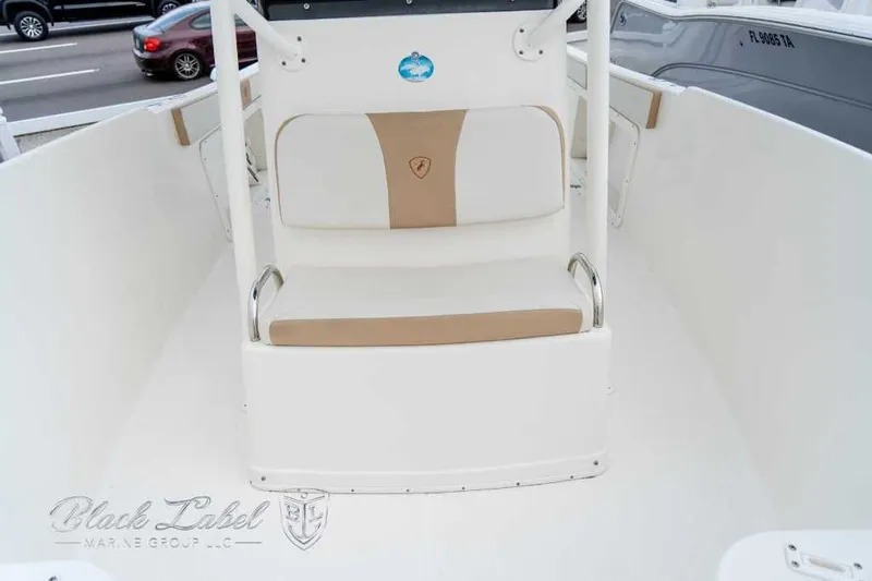 Slide: The Image of 2017 Century 2600 boat interior with beige and white seating. - 7