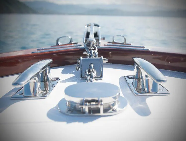 Slide: The Image of 2025 Maverick Yachts Costa Rica 36 Walkaround bow with polished cleats and anchor chain. - 6