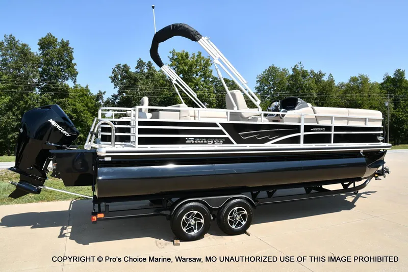 Slide: The Image of 2025 Ranger 223FC pontoon boat with 200HP Mercury 4 Stroke engine on trailer. - 12