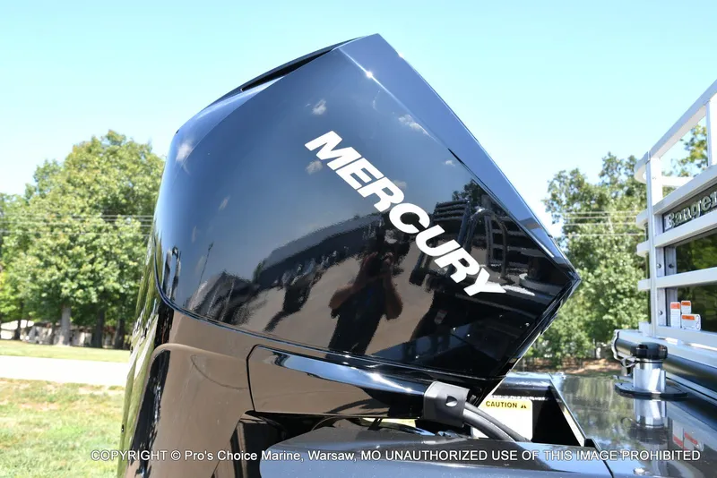 Slide: The Image of 2025 Ranger 223FC with 200HP Mercury 4 Stroke engine, outdoor display. - 13
