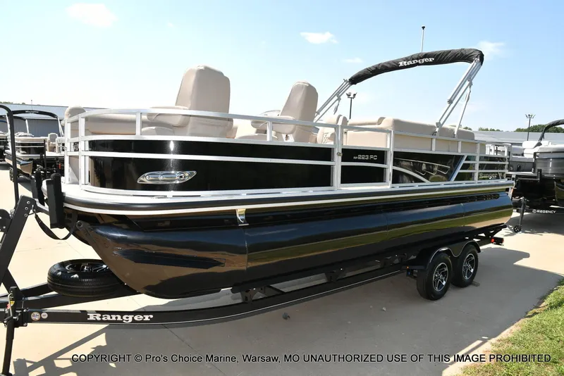 Slide: The Image of 2025 Ranger 223FC pontoon boat with 200HP Mercury 4 Stroke engine on trailer. - 16