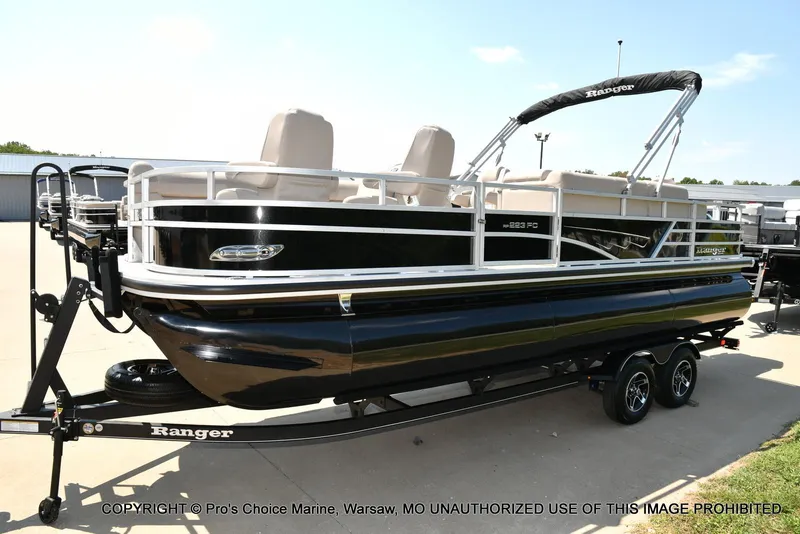 Slide: The Image of 2025 Ranger 223FC pontoon boat with 200HP Mercury 4 Stroke engine on trailer. - 17