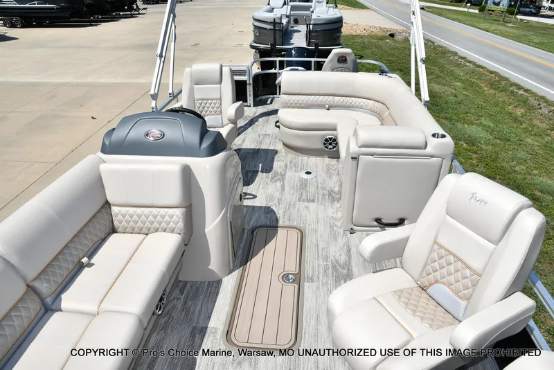 Slide: The Image of Luxurious 2025 Ranger 223FC pontoon boat interior with plush seating and modern design. - 20