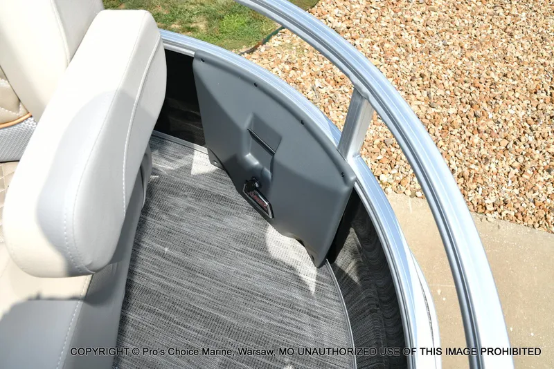 Slide: The Image of Interior of 2025 Ranger 223FC boat with gray seating and carpeted flooring. - 22