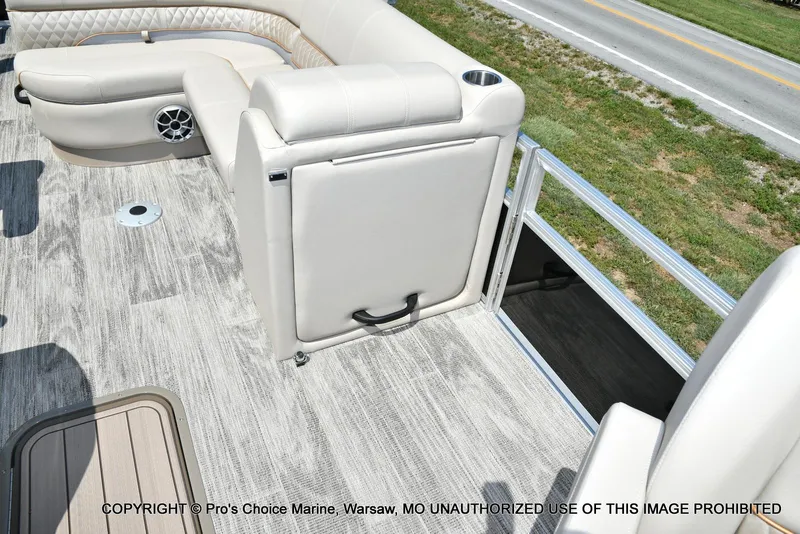 Slide: The Image of 2025 Ranger 223FC boat interior with plush seating and modern flooring. - 24
