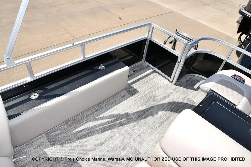 Slide: The Image of 2025 Ranger 223FC boat interior with seating and railing, featuring a 200HP Mercury 4 Stroke engine. - 37
