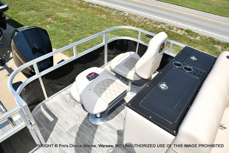 Slide: The Image of 2025 Ranger 223FC boat interior with Mercury 200HP engine, featuring seating and control panel. - 39