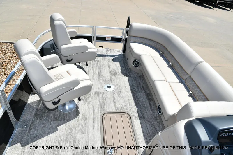 Slide: The Image of 2025 Ranger 223FC boat interior with plush seating and modern design. - 4