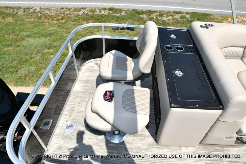 Slide: The Image of 2025 Ranger 223FC boat interior with seating and console, featuring 200HP Mercury 4 Stroke. - 41