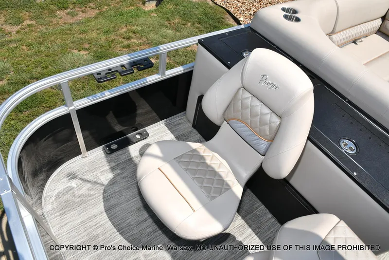 Slide: The Image of 2025 Ranger 223FC boat interior with plush seating and modern design. - 42