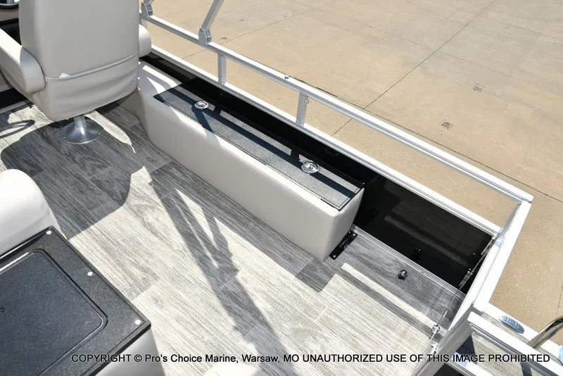 Slide: The Image of 2025 Ranger 223FC boat interior with seating and storage compartments. - 48