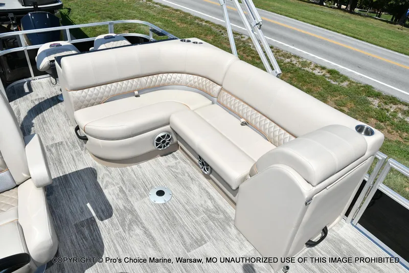 Slide: The Image of 2025 Ranger 223FC boat interior with plush seating and modern design. - 5