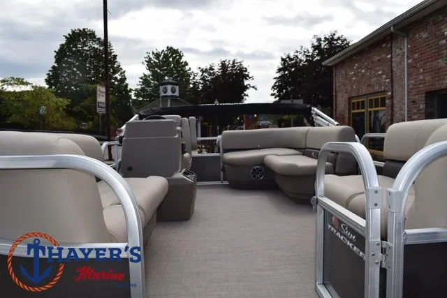Slide: The Image of 2025 Sun Tracker PARTY BARGE® 16 DLX pontoon boat with spacious seating and modern design. - 10