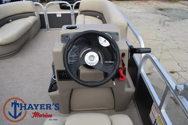Slide: The Image of 2025 Sun Tracker PARTY BARGE® 16 DLX steering console at Thayer's Marine. - 22