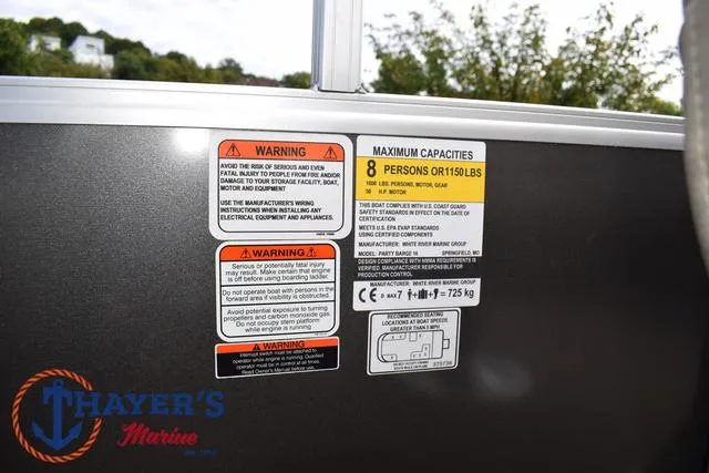 Slide: The Image of Warning labels on 2025 Sun Tracker PARTY BARGE® 16 DLX, maximum capacity 8 persons or 1150 lbs. - 23
