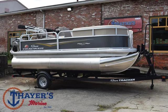 Slide: The Image of 2025 Sun Tracker PARTY BARGE® 16 DLX pontoon boat on trailer at Thayer's Marine. - 36