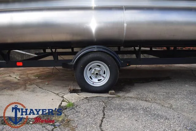 Slide: The Image of 2025 Sun Tracker PARTY BARGE® 16 DLX trailer wheel at Thayer's Marine. - 6