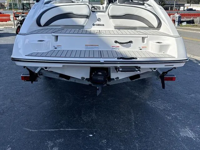 Slide: The Image of 2025 Yamaha AR195 boat interior with sleek design, modern dashboard, and comfortable seating. - 10