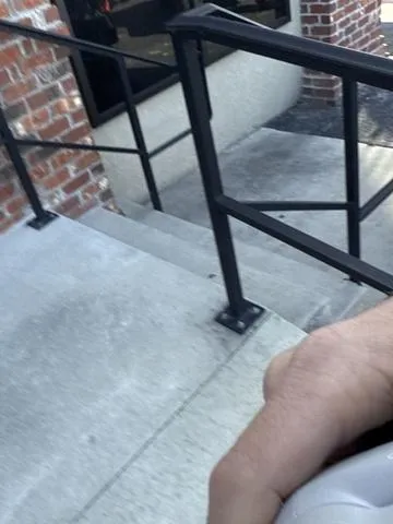 Slide: The Image of 2025 Yamaha AR195 boat, white, galvanized, rear view with swim platform and seating. - 14